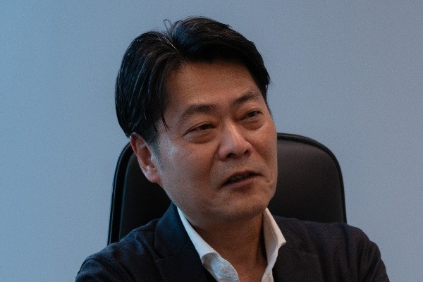三菱総研ＤＣＳ株式会社 産業・公共部門 サービス事業本部長 冨永 進氏